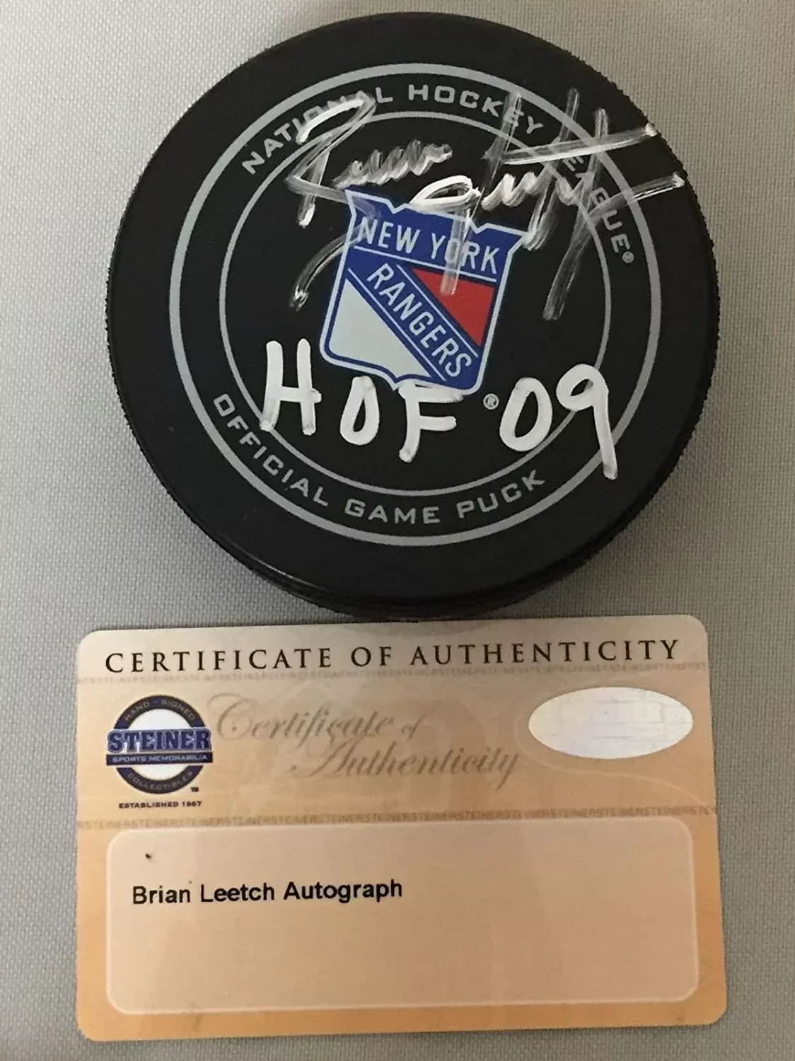 Autographed/Signed Brian Leetch HOF 09New York Rangers Official Game Hockey Puck Steiner Sports COA