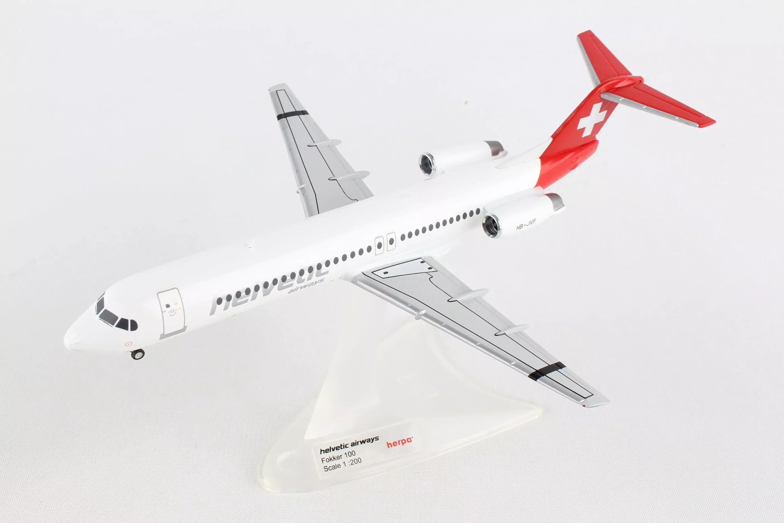 Herpa Wings HE559324 Helvetic F-100 1/200